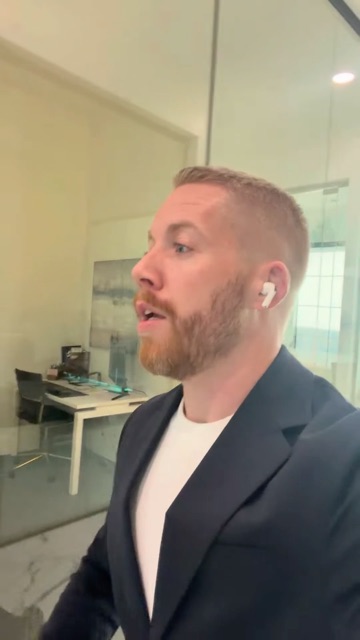 AirPods in, walking and talking through the office